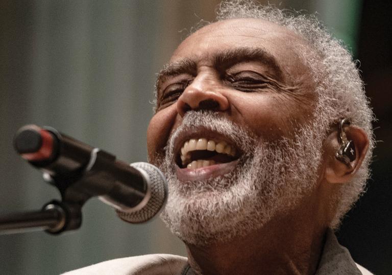 close up photo of Gilberto Gil performing