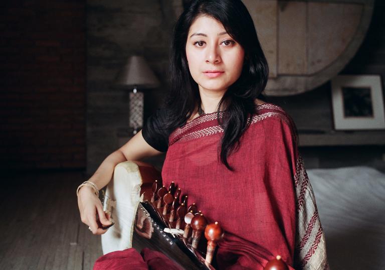 Rajrupa Chowdhury seated with her sarod