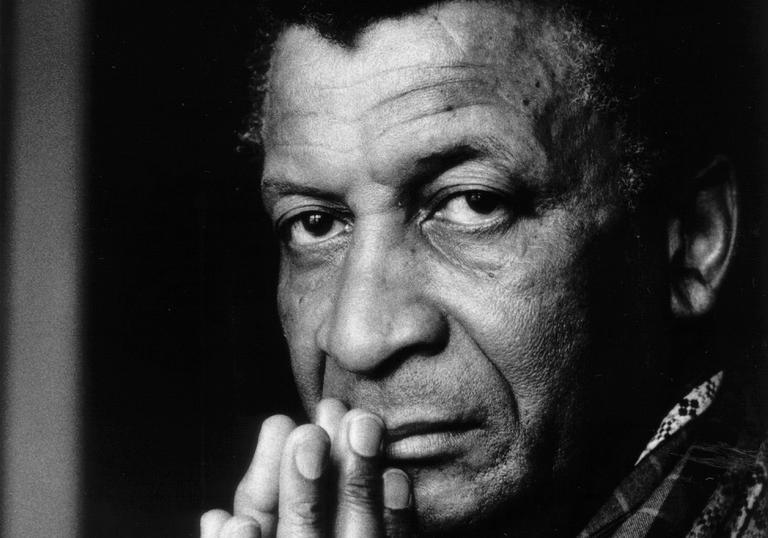 a close up black and white photo of Abdullah Ibrahim