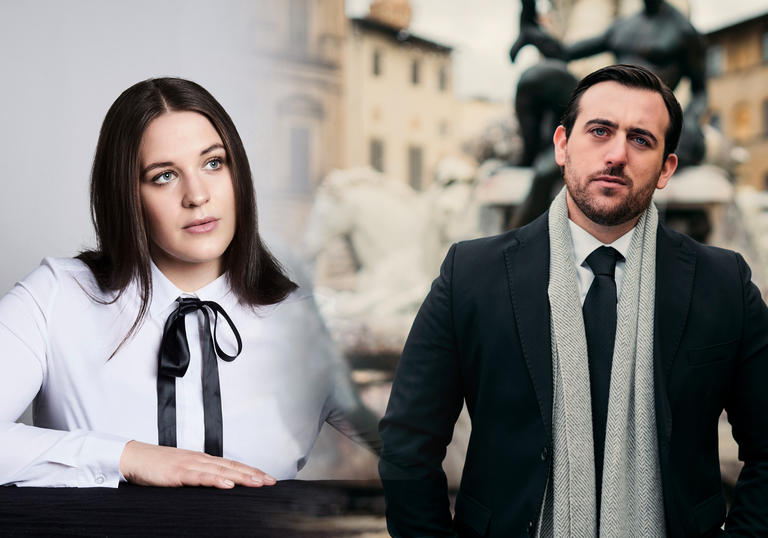 Lise Davidsen is sitting with her arm resting on a table on the left hand side of the image, Freddie De Tommaso stands in front of a fountain in coat and scarf on the right