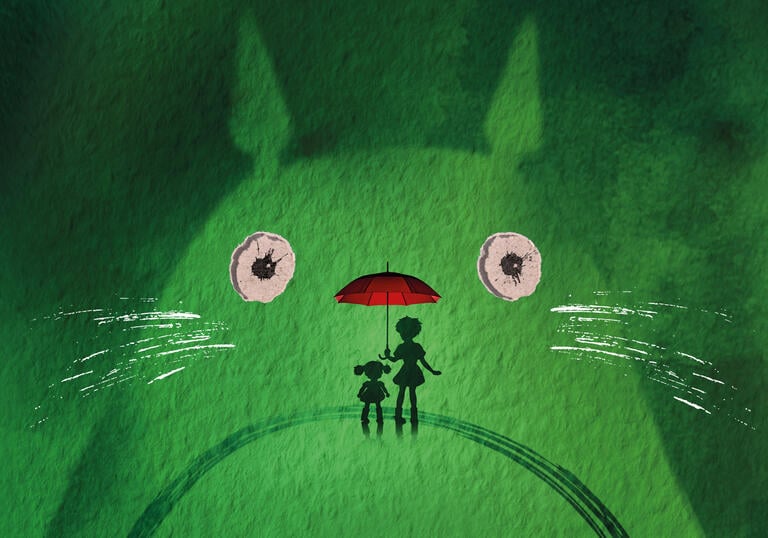 An illustration of the Totoro character with green watercolour washes of paint. Inside Totoro's face is the silhouette of two small characters holding a red umbrella.