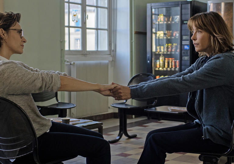 Géraldine Pailhas  and Sophie Marceau holding hands in a hospital setting in Everything Went Fine 