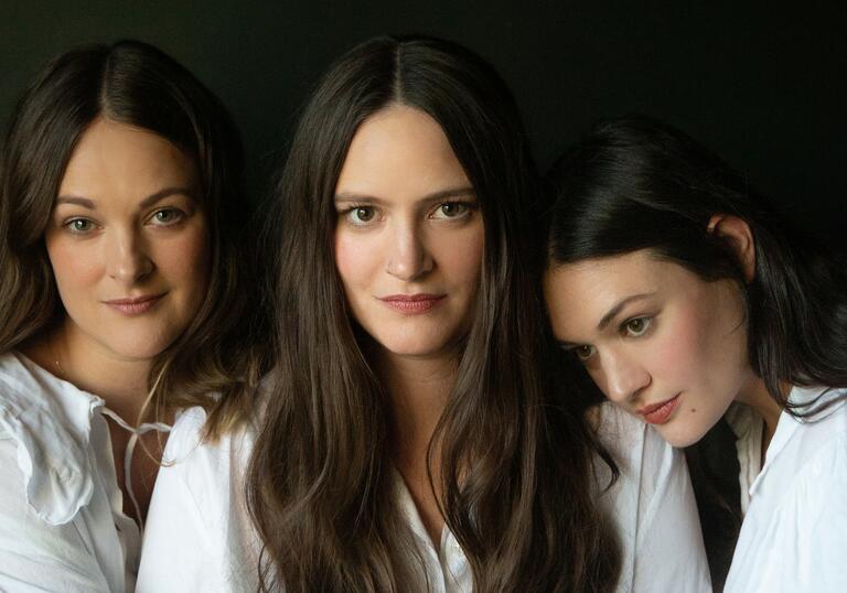 Headshot of the three members of the staves