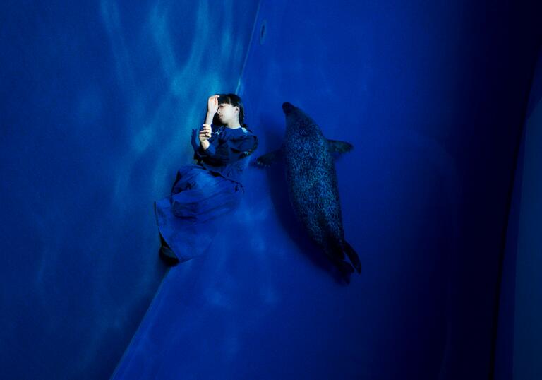 Artistic portrait of Ichiko Aoba, under water