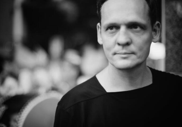 Black and white photo of Carsten Nicolai from Alva Noto