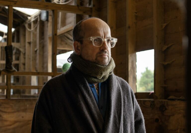 Matthew Herbert in an open windowed stables