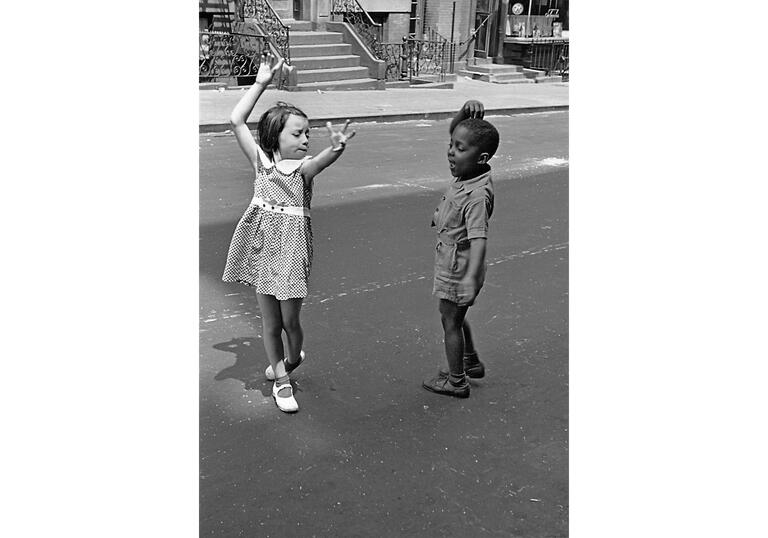 black and white helen levitt photo of two children playing
