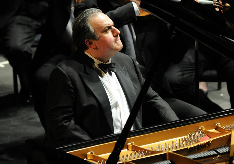 Pianist Yefim Bronfman performing on stage
