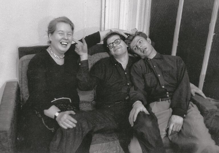 black and white photo of Alice Neel, Allen Ginsberg and Gregory Corso during the making of the film Pull My Daisy by Robert Frank and Alfred Leslie, 1959. Photograph by John Cohen. 