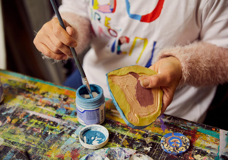 a colour photo of a person making art