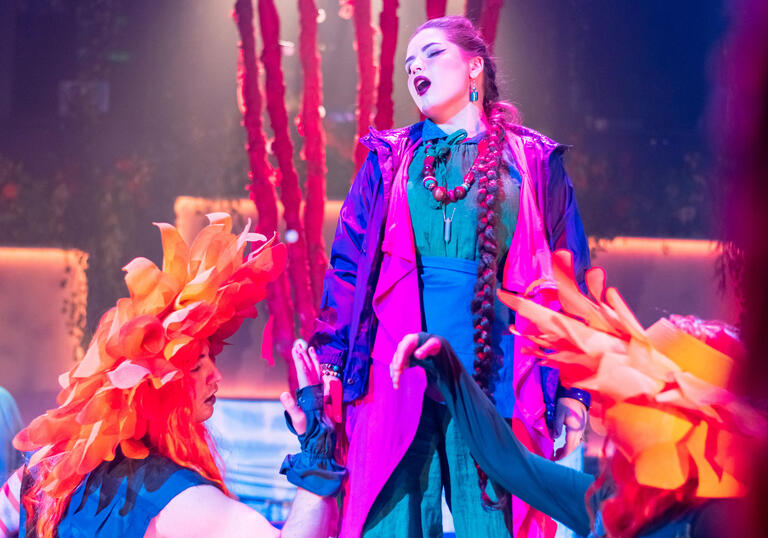 Guildhall School opera singer performing in a colourful set