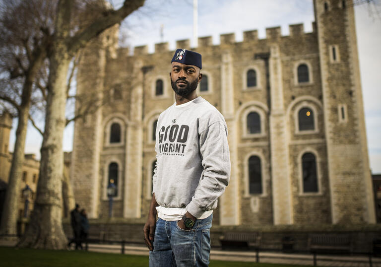 Inua Ellams standing outside the Tower of London