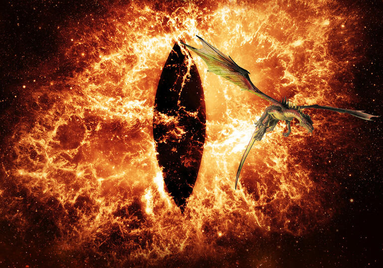 The eye of Sauron from Lord of the Rings and a dragon flying in front of it