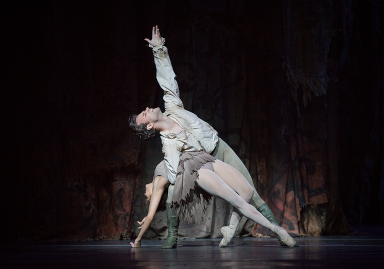 A ballet dancer performs on stage