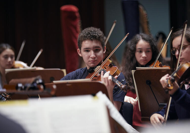 Four young string players