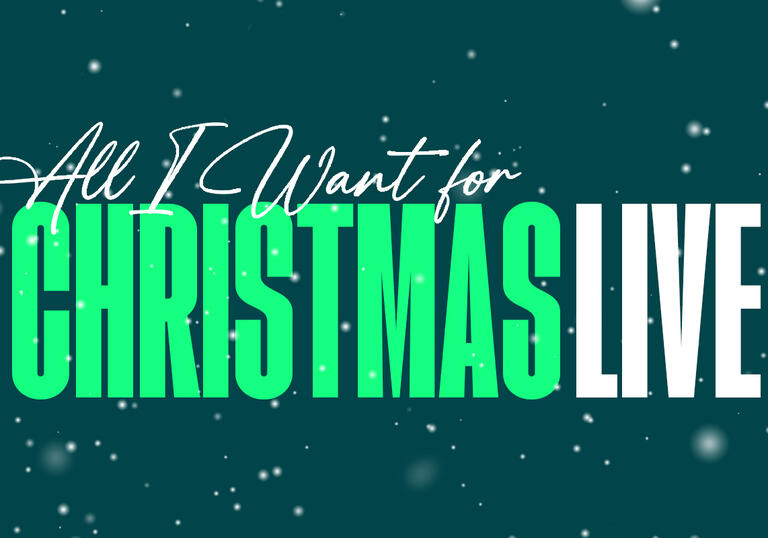 The words All I Want for Christmas Live against a teal background, flecked with snow