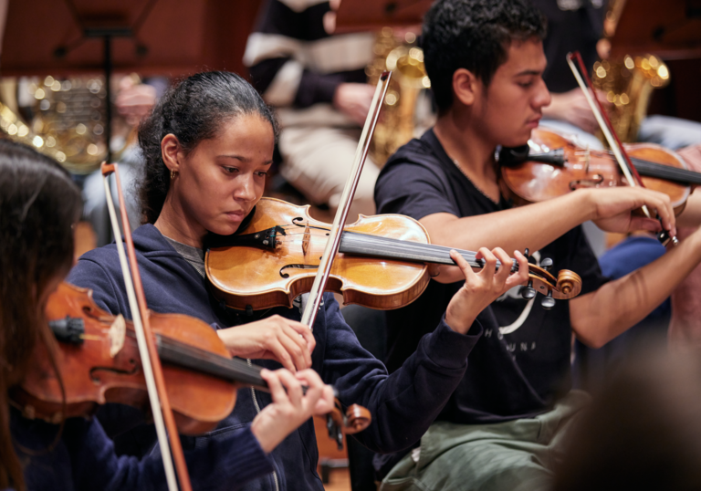 Junior Guildhall violinists performing