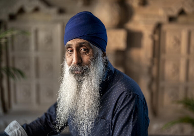 Davinder Panesar turning to look at the camera