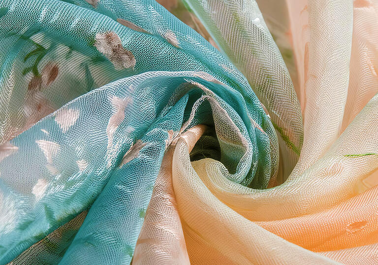 Silk chiffon fabric with a floral pattern, twisted to form a swirl