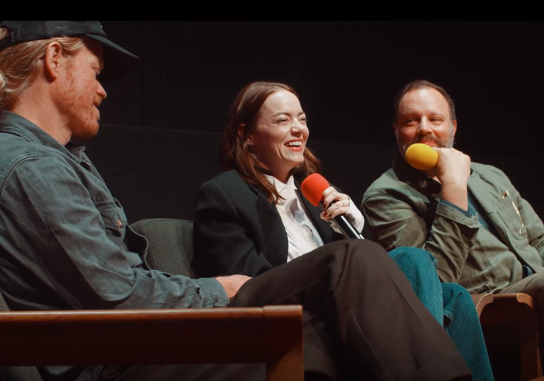 Jesse Plemmons, Emily Stone and Yorgos Lanthimos laugh on stage during a screentalk. 