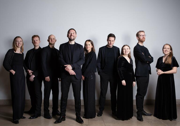 Marian Consort dressed in black