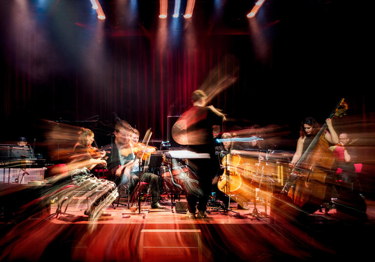 A blurred picture of a classical ensemble on stage