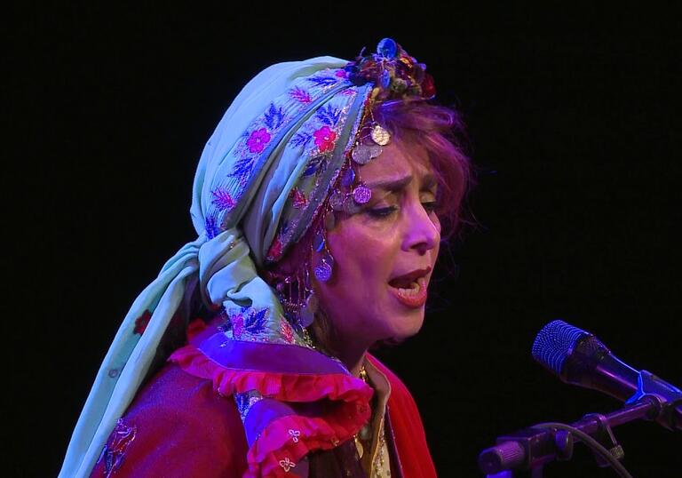 Sima Bina on stage