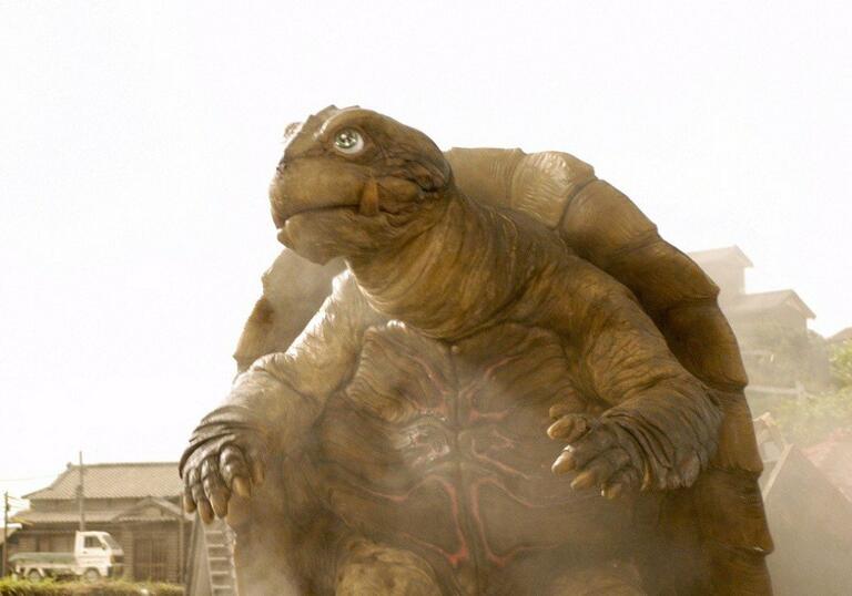 A film still showing Gamera, the turtle-like monster