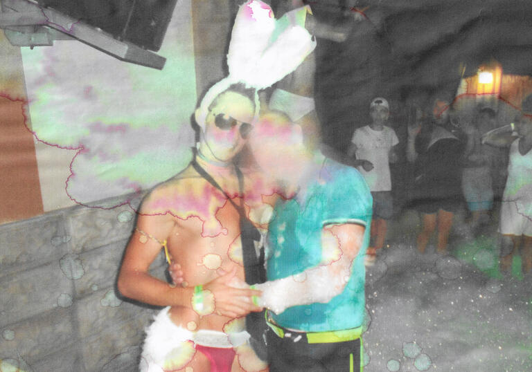 Simeiz image of men in bunny ears with blurred faces 