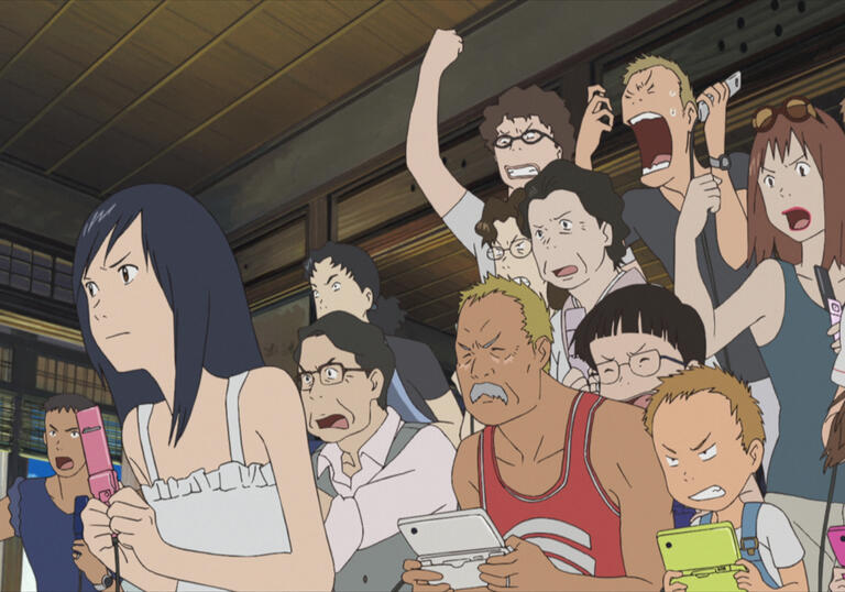 A young girl and a crowd behind her cheering