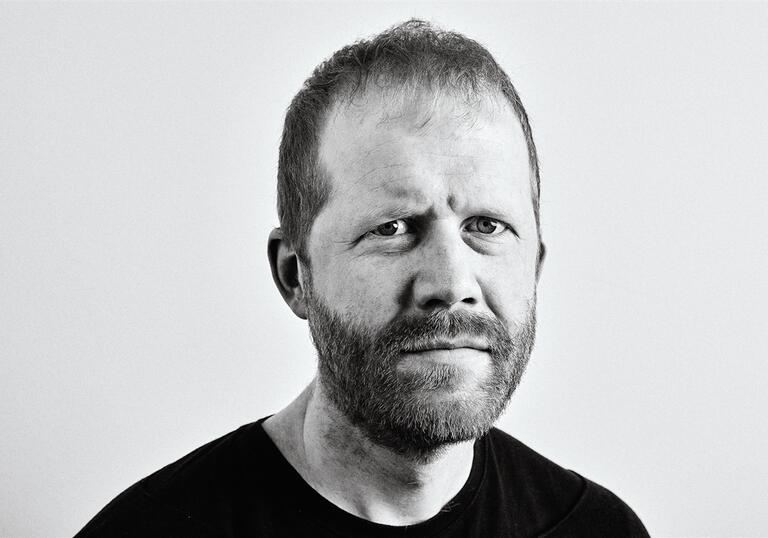 Black and white portrait of Andreas Malm