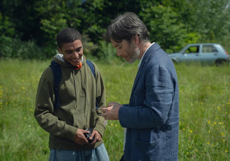 Two men talking