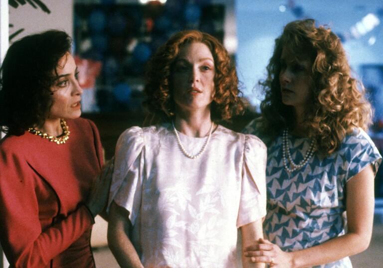 Three women standing together