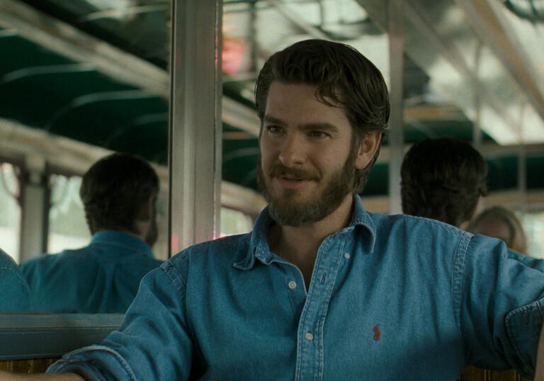 A man sitting on a bus