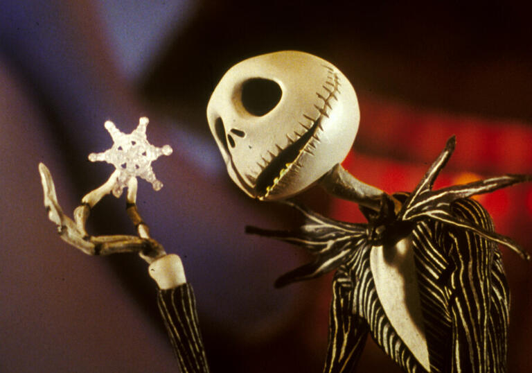 Jack Skellington holds a snowflake