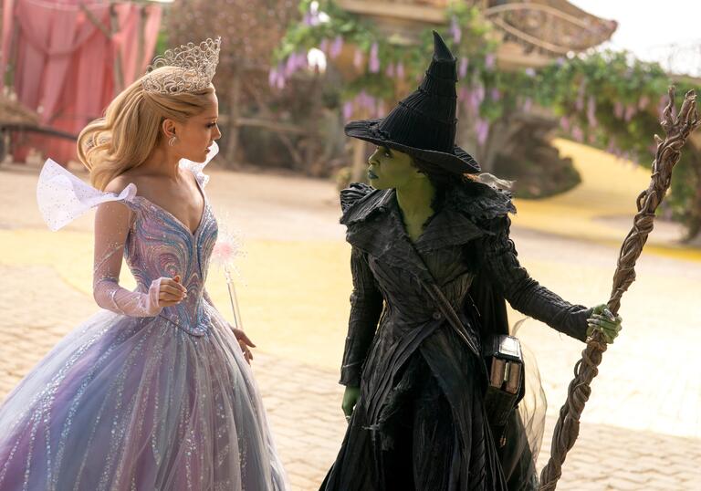 Glinda and Elphaba face each other
