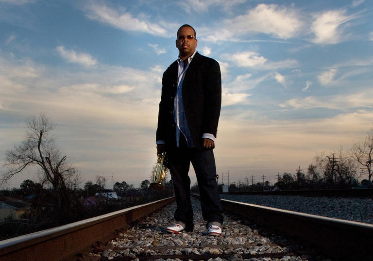 Terence Blanchard standing on train tracks - watch out, Terence!