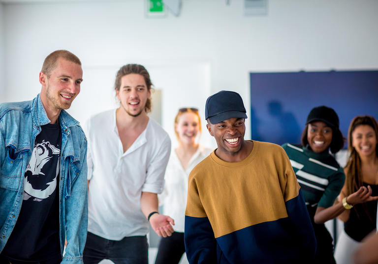 A group dancing in a workshop