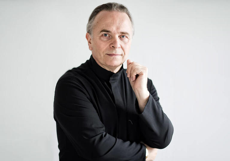 A colour headshot of Sir Mark Elder