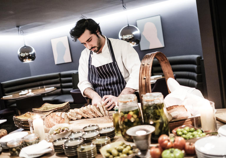 A photo of a chef in Barbican's restaurant, Osteria
