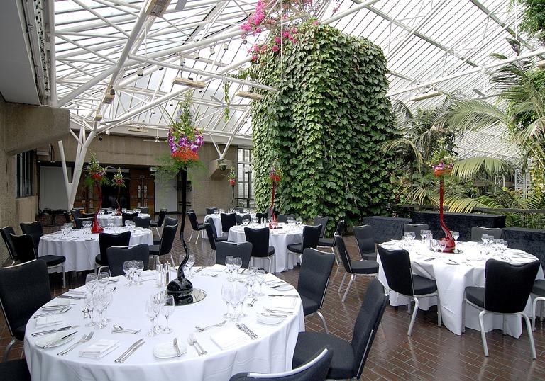 Photo of the Barbican Conservatory Terrace laid out with tables