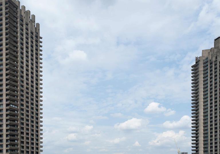 an example of Brutalist architecture in London, the Barbican Centre towers