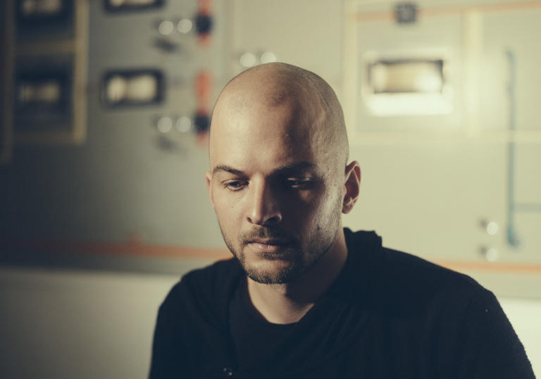 Nils Frahm gazing downwards