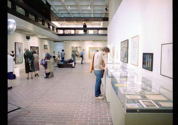 Archive photo of man looking at art in the Barbican Art Gallery