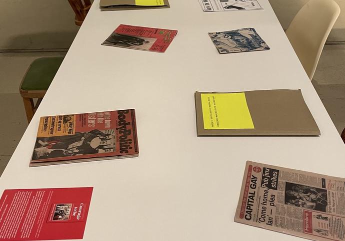 A table with various magazines displayed