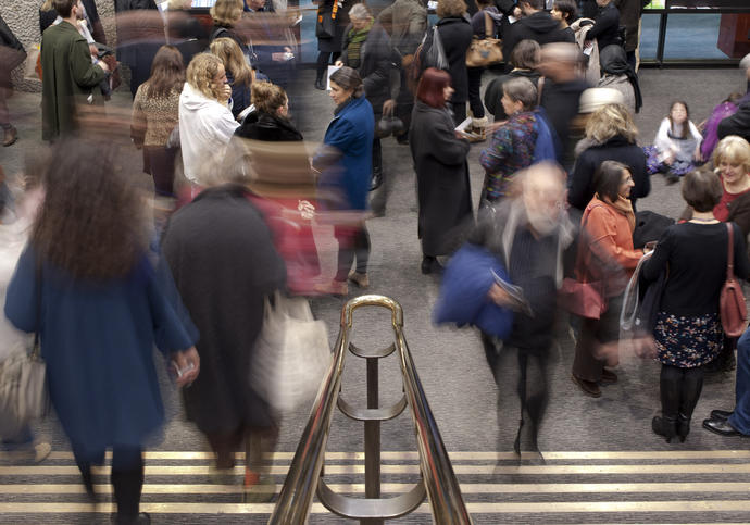 Photo of crowd of people on stairs in Barbican Foyers