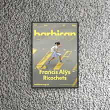 Francis Alys Exhibition poster in a black frame
