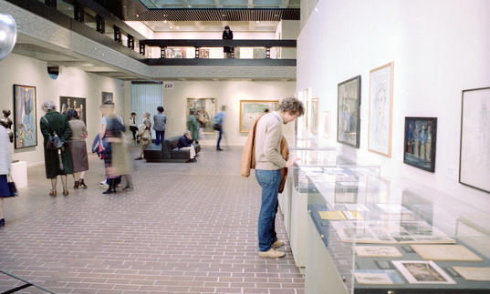 Archive photo of man looking at art in the Barbican Art Gallery