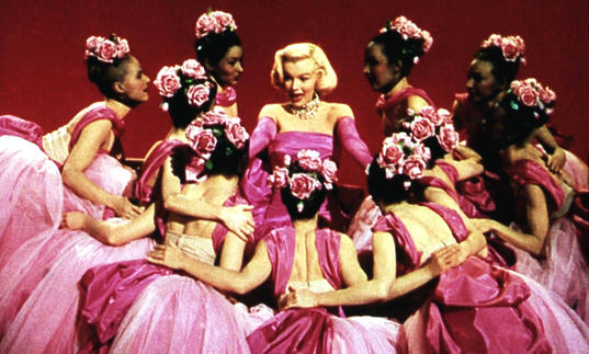 Marilyn Monroe surrounded by fan girls in Gentlemen Prefer Blondes