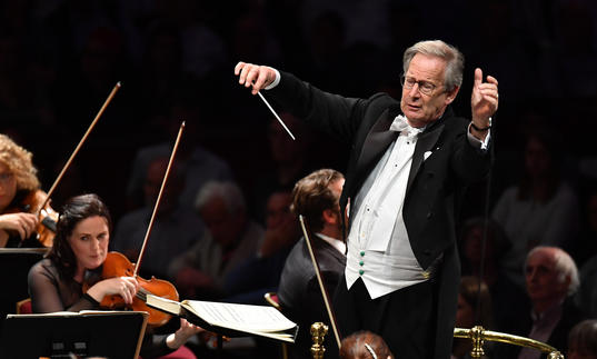 John Edward Gardiner conducting masterfully on stage